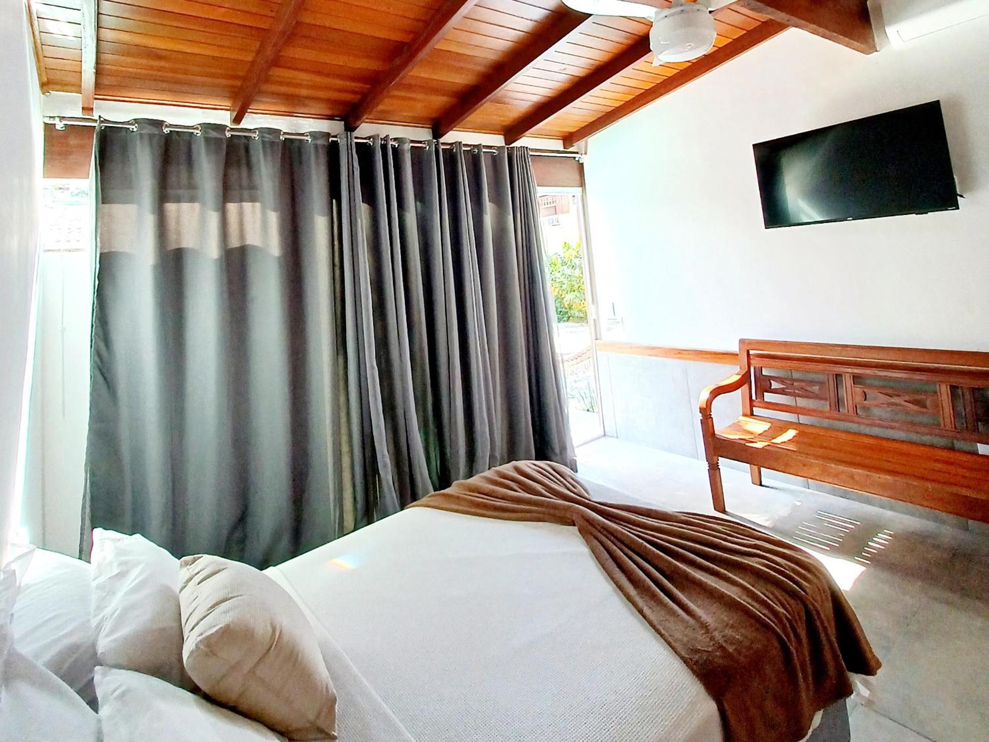 Suites Estou De Ferias Парати Номер фото